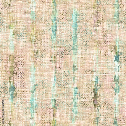 Rustic mottled linen woven texture. Seamless printed fabric pattern. Tropical pastel coastal style. Interior textile background. Mottled colorful peach green dye stains. Soft rustic summer home decor 