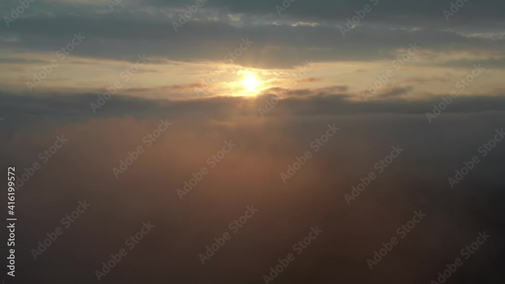 Sunshine from Sunrise on Horizon in the Clouds, Aerial Heaven Concept Sunshine from Sunrise on Horizon in the Clouds, Aerial Heaven Concept