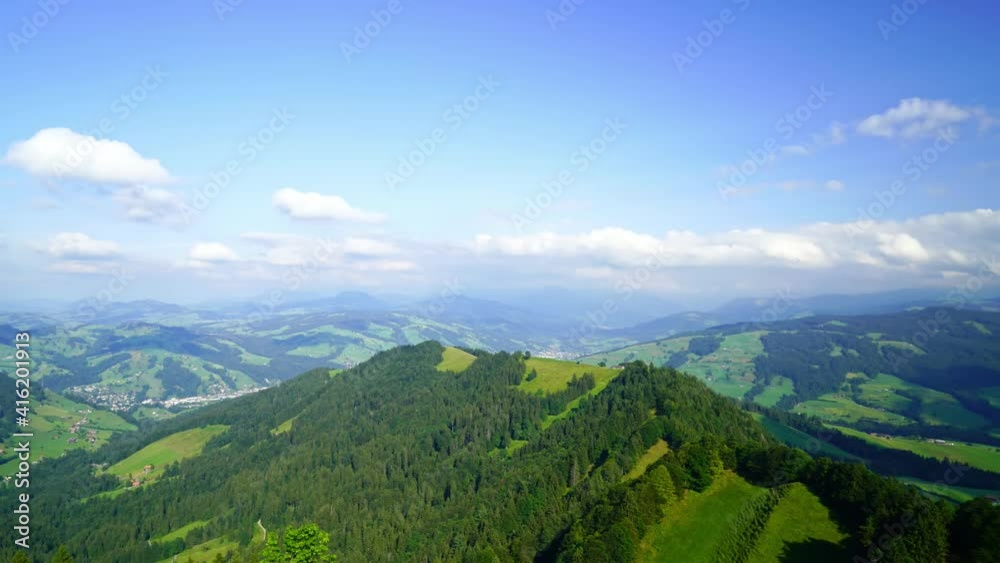 Aerial time-lapse view of beautiful clouds flowing over the green Swiss Appenzell Alps Aerial time-lapse view of beautiful clouds flowing over the green Swiss Appenzell Alps
