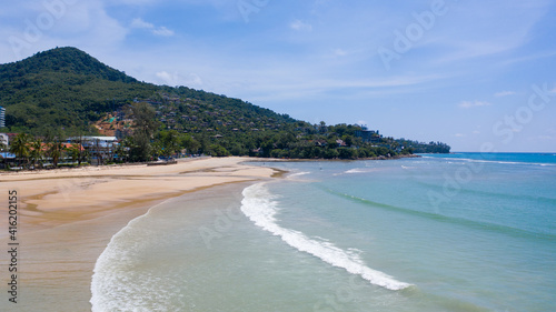 Aerial: Kamala beach is a beautiful white-sand beach which is located at Phuket, Thailand