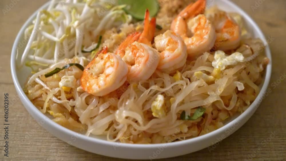 stir-fried noodles with shrimp and sprouts or Pad Thai - Asian food style stir-fried noodles with shrimp and sprouts or Pad Thai - Asian food style