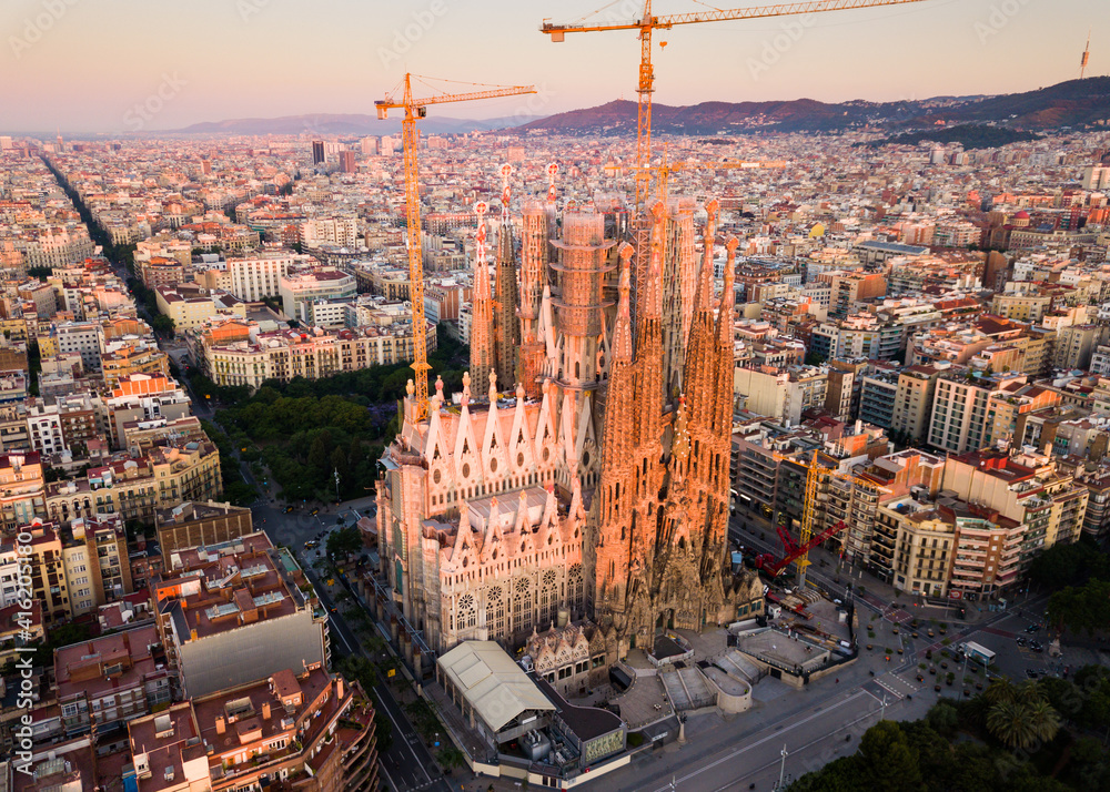Aerial view of Sagrada Familia and Barcelona cityscape at early morning