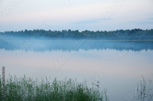 The nature of Seliger. Evening fog on Lake Glubokoe in the Tver region, Russia