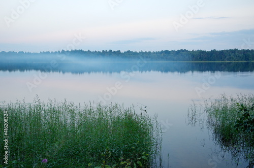 The nature of Seliger. Evening landscape with fog on Lake Glubokoe in the Tver region, Russia