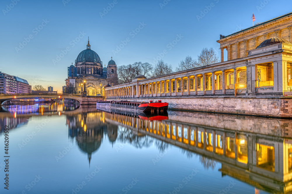 The Berlin Cathedral on the Museum Island and the river Spree before sunrise