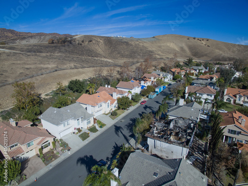 A neighborhood that mostly survived a wildfire's destruction photo