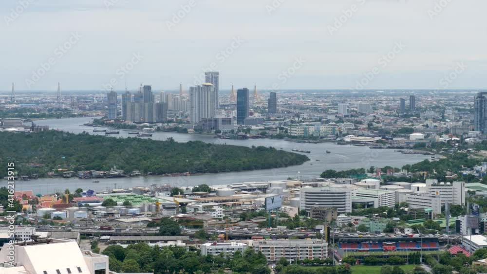 City panorama with Chao Phraya River in capital Bangkok, Thailand. Highrise real estate with skyscrapers in downtown City panorama with Chao Phraya River in capital Bangkok, Thailand. Highrise real estate with skyscrapers in downtown