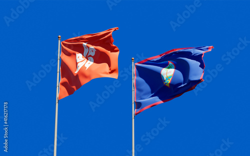 Flags of Hong Kong HK and Guam.