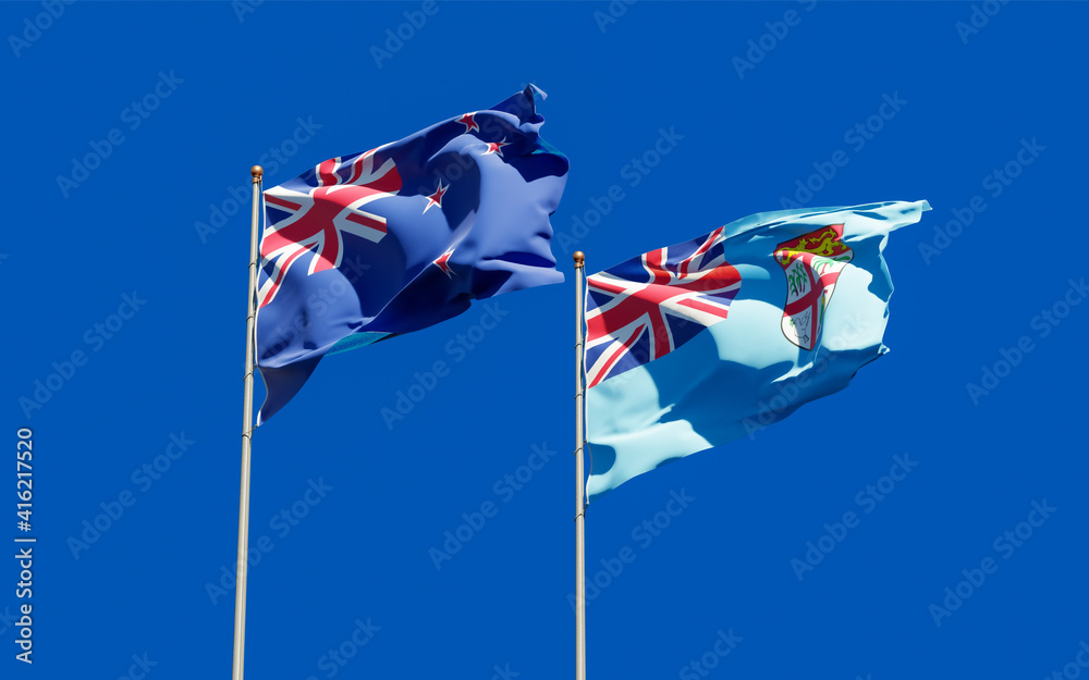 Flags of Fiji and New Zealand.