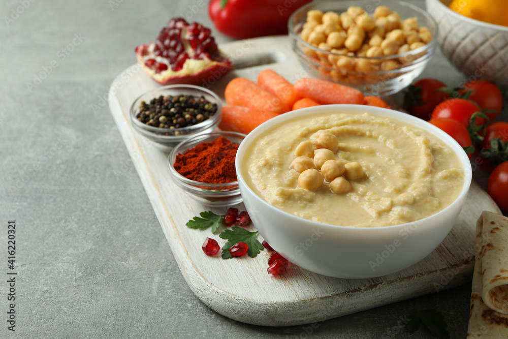 Concept of cooking hummus on gray background, space for text Concept of cooking hummus on gray background, space for text