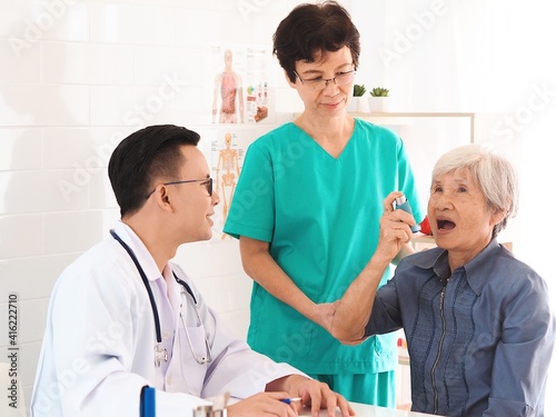 doctor talking to senior patient