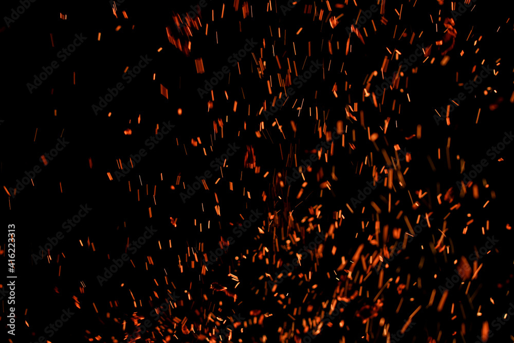 flame of fire with sparks on a black background flame of fire with sparks on a black background