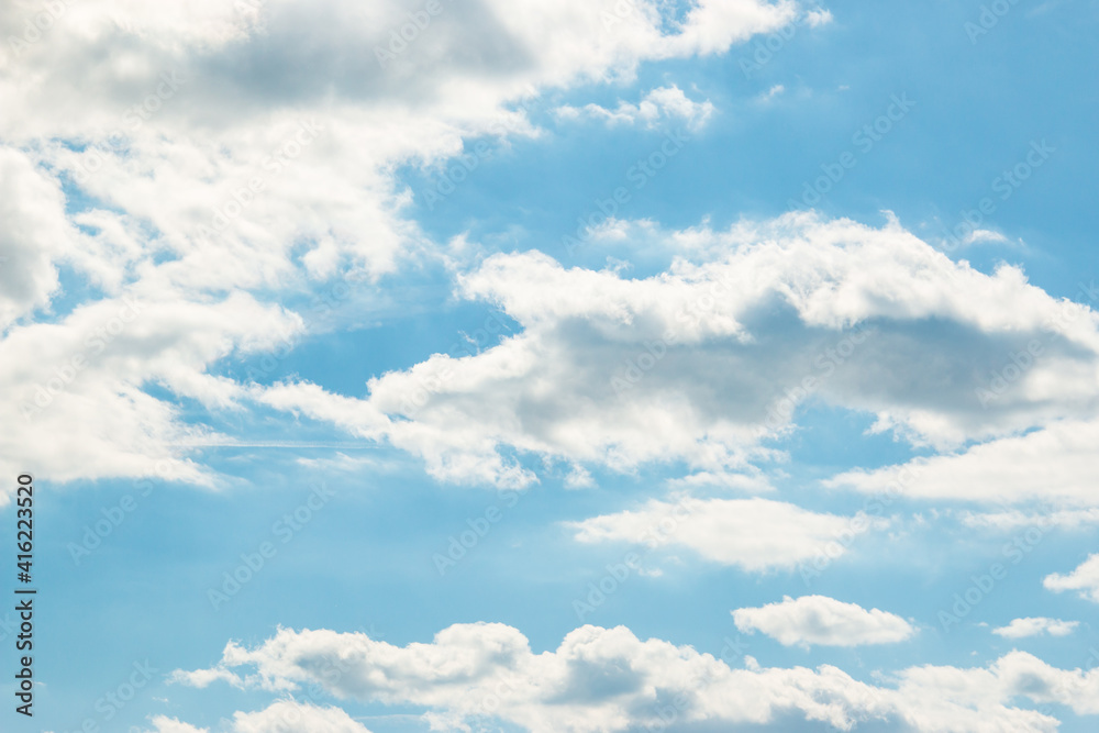 white clouds on a blue sky