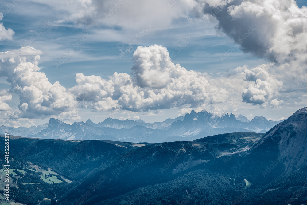panoramic view of the Dolomites with beautiful weather clouds , Italy. panoramic view of the Dolomites with beautiful weather clouds , Italy.