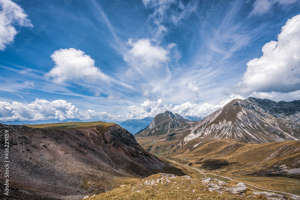 Obraz premium panoramic view of the Dolomites with beautiful weather clouds , Italy.