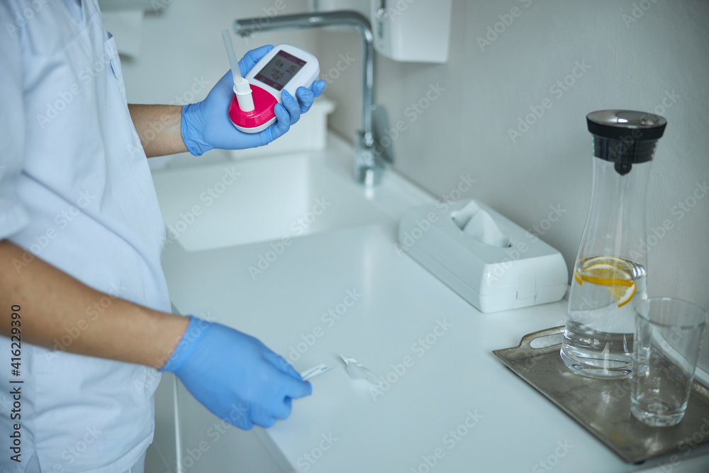 Physician getting ready to measure the lung volume Physician getting ready to measure the lung volume