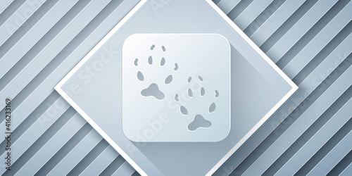 Paper cut Fox paw footprint icon isolated on grey background. Paper art style. Vector.