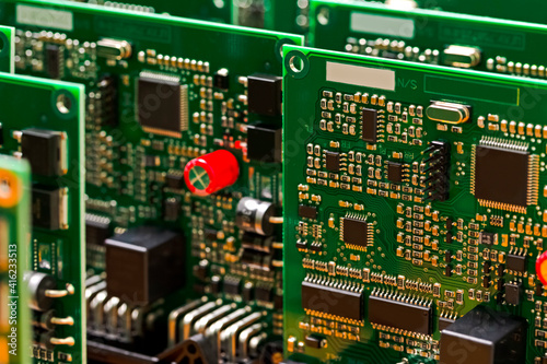 Electronic Ideas. Extreme Close-up of Produced Automotive Printed Circuit Boards with Soldered SMD or Surface Mounted Components.