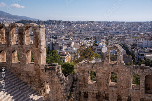 Ancient Odeon of Herodes Atticus theater - amphitheater of Acropolis of Athens, Greece.Landmark of Greece. Scenic view of Ancient Greek ruins overlooking Athens city.