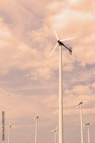 Wind turbine or wind park on the sky.
