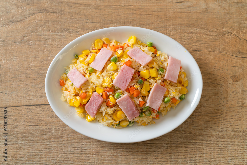fried rice with ham and mixed vegetable (carrot, green bean peas, carrot) fried rice with ham and mixed vegetable (carrot, green bean peas, carrot)
