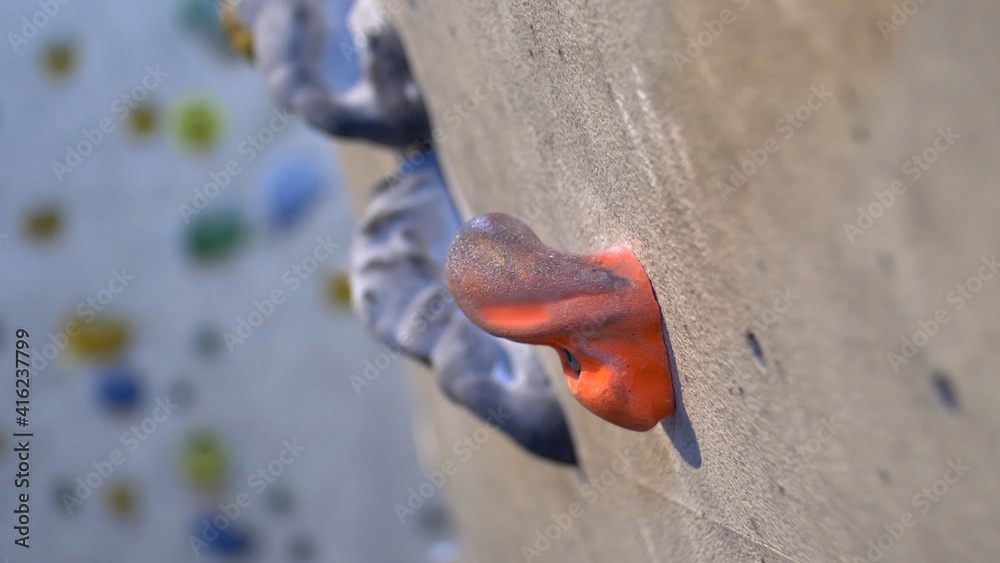 Young Caucasian Girl Climbing Indoor Climbing Wall Close Up Young Caucasian Girl Climbing Indoor Climbing Wall Close Up