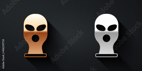 Gold and silver Balaclava icon isolated on black background. A piece of clothing for winter sports or a mask for a criminal or a thief. Long shadow style. Vector.