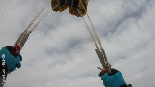 Skydiving. A parachute deployment in the winter sky.