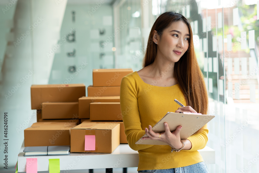 Successful Woman Entrepreneur With Parcel Boxes In Her Own Job Shopping Online Business At Home Successful Woman Entrepreneur With Parcel Boxes In Her Own Job Shopping Online Business At Home