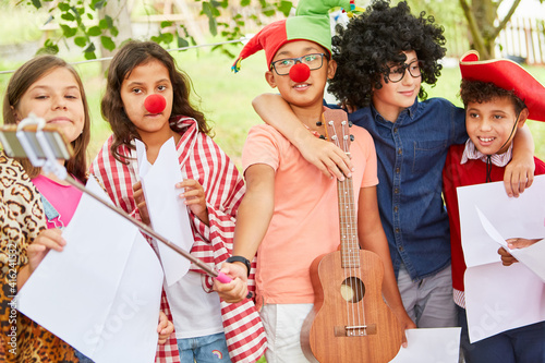 Children in funny disguise at a talent show