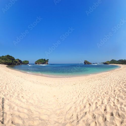 Stunning view, Crystal clear water & white sand beach at Watu Karung Beach Pacitan East Java Indonesia