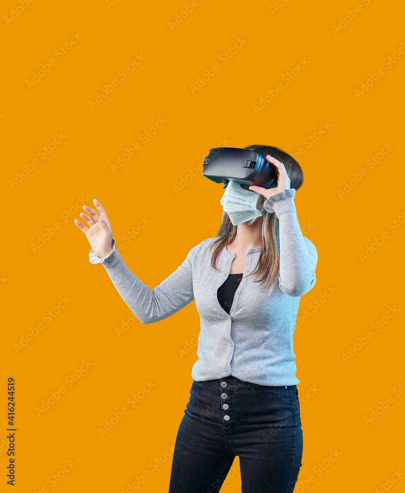 Girl is wearing virtual glass, pandemic and using mask style, colorful background. Girl is wearing virtual glass, pandemic and using mask style, colorful background.