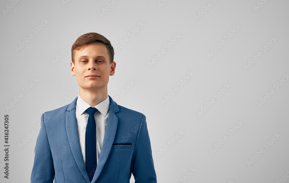 Man blue jacket tie manager official Professional gray background Man blue jacket tie manager official Professional gray background
