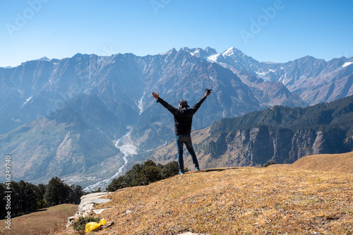 Person on top of mountain in manali, Himachal Pradesh, India