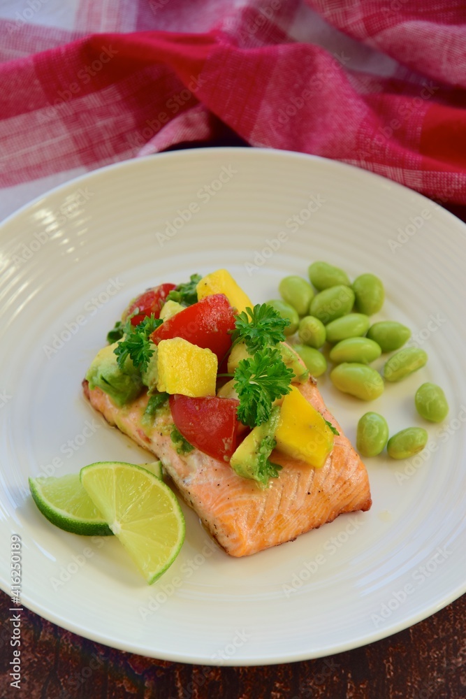 Grilled salmon with mango avocado tomato salsa and edamame beans Grilled salmon with mango avocado tomato salsa and edamame beans
