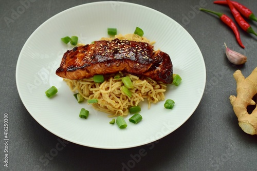 Somen noodle with teriyaki salmon, sprinkle with sliced scallions and sesame seeds