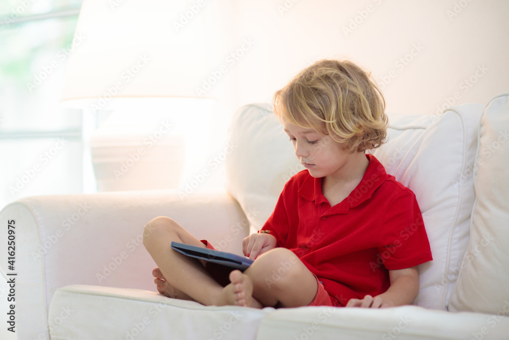 Child with tablet computer. Kids study online. Child with tablet computer. Kids study online.