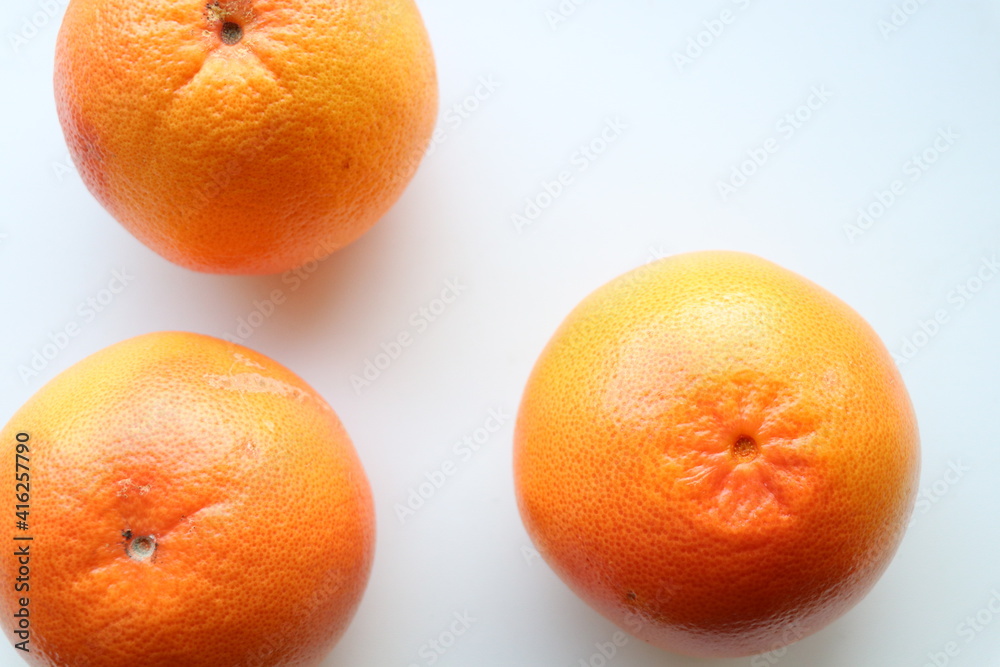 Top view of grapefruits on white background Top view of grapefruits on white background