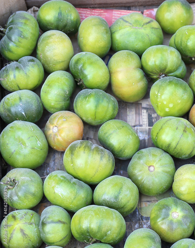 Organic Green Tomatoes at Farmers Market Organic Green Tomatoes at Farmers Market