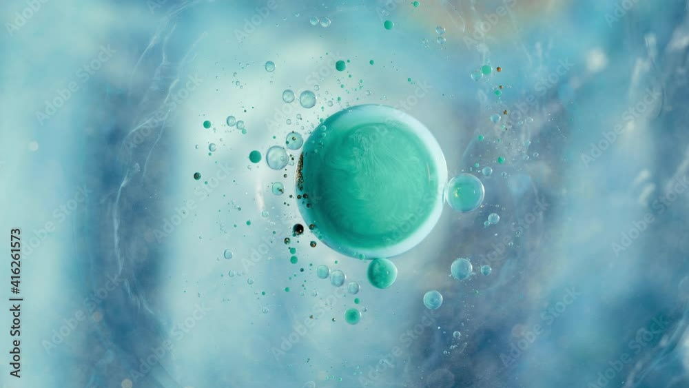 Colorful Silicone Oil Fluid Art Abstract Acrylic Liquid Bubbles Galaxy Swirling around with Flowing Effect. Organic Pour Painting Marble Ink Paint Visual Effects Motion Background Top View ProRes 4k
