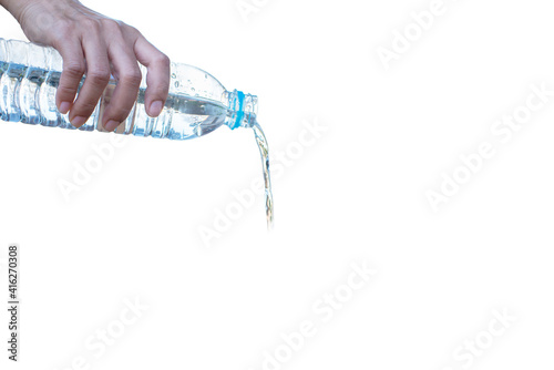 The hand that is pouring water out of the bottle