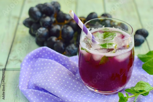 Photography Grape mint soda mocktail with fresh grapes background