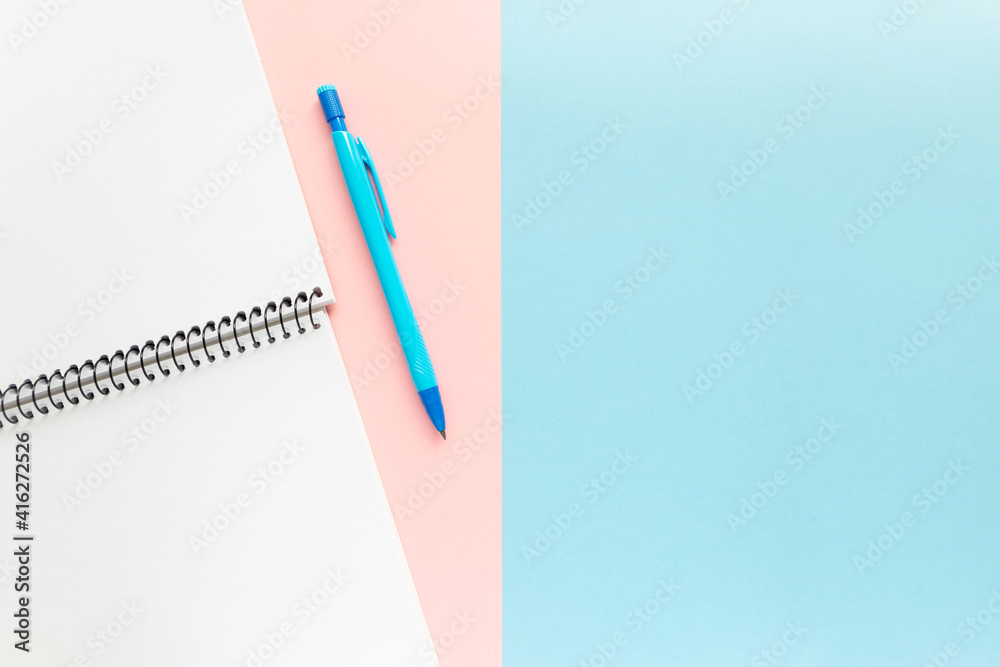 Study space with notebook and pen