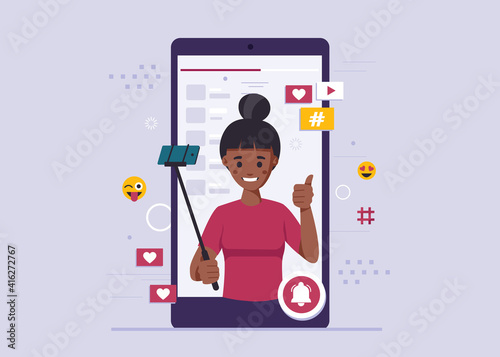 Black woman takes a selfie. African-american male blogger, online blogging