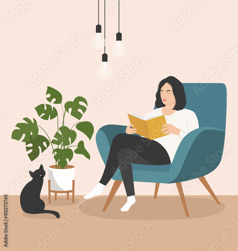 Young woman is relaxing on comfortable chair and reading book and cat. Vector flat style cartoon illustration.