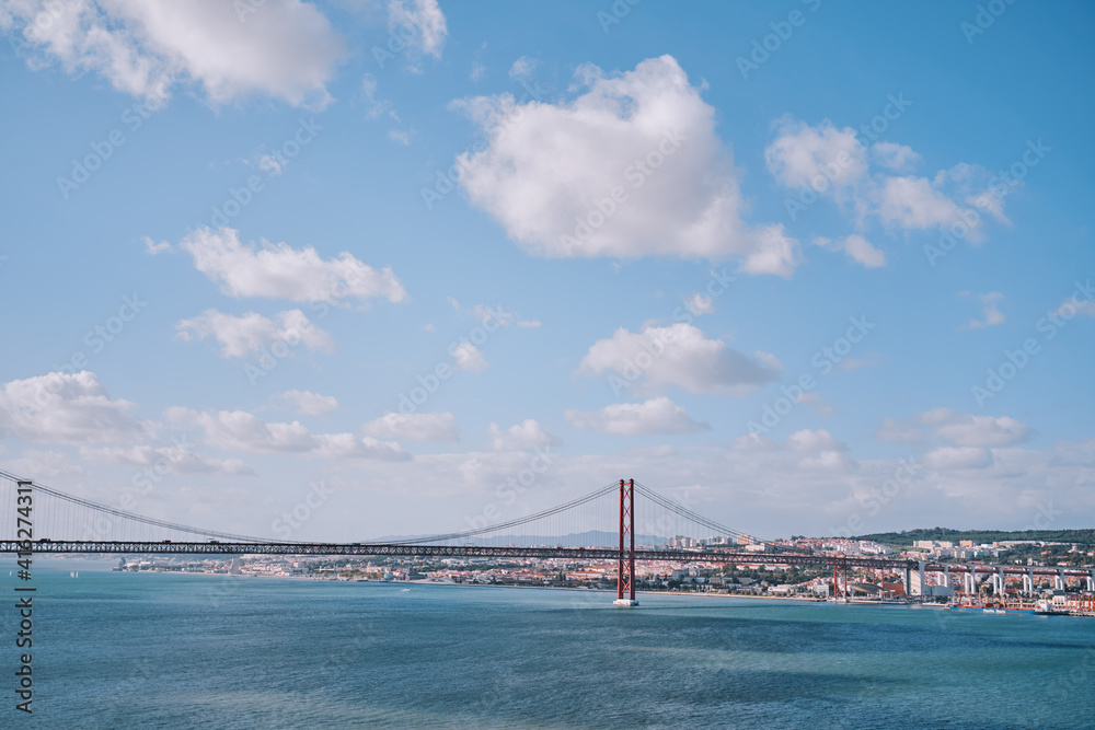 Beautiful landscape with suspension 25 April bridge bridge over the Tagus river in Lisbon, Portugal. Beautiful landscape with suspension 25 April bridge bridge over the Tagus river in Lisbon, Portugal.