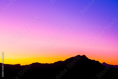 Silhouette Mountains Top During Sunrise over Jebel Jais in UAE