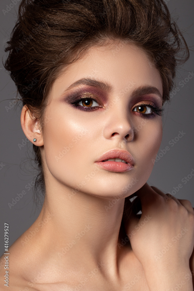 Portrait of beautiful woman with evening makeup Portrait of beautiful woman with evening makeup