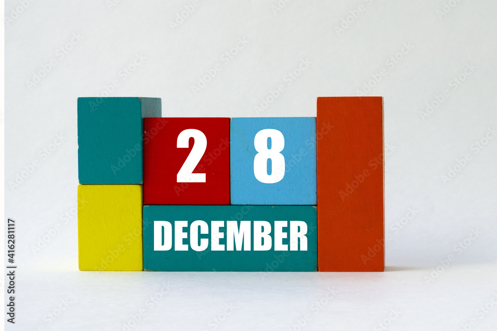 Day of month. Cube Calendar on multi-colored cubes on white background Day of month. Cube Calendar on multi-colored cubes on white background