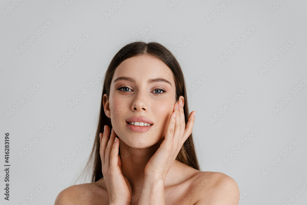 Happy shirtless girl smiling and looking at camera Happy shirtless girl smiling and looking at camera